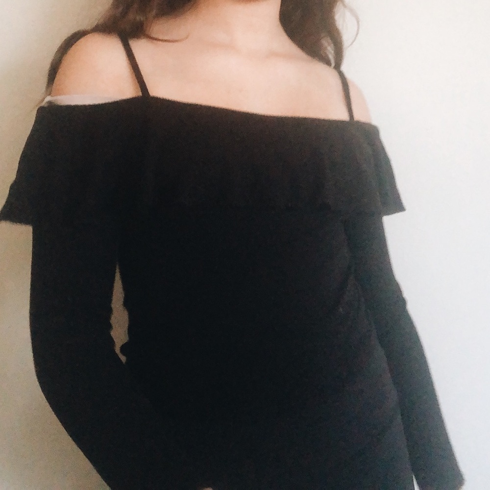 black long sleeve off the shoulder shirt